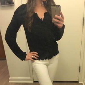 Long sleeve, ruffle and button-front blouse