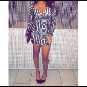 Shimmery black and nude plunge dress!