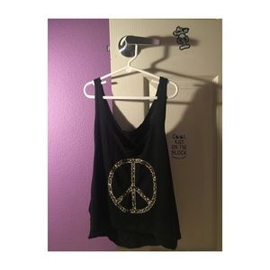 Black tank top with flower peace sign detailing