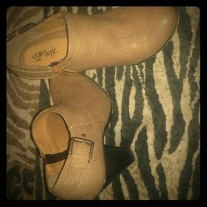 Tan booties with 2.5 inch heel.  Very comfortable