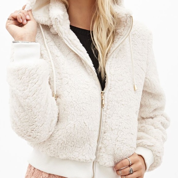 white fur zip up jacket