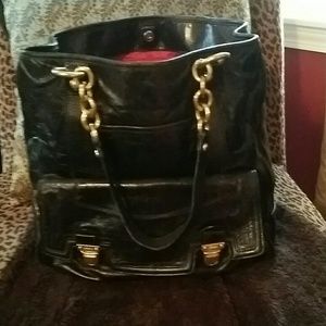Coach black leather hand bag
