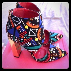 Brand new fashionable multi print  cutout booties!