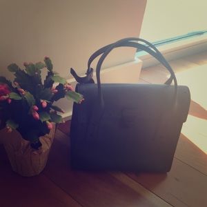 Cute messenger bag from TriBeCa by Joy Gryson