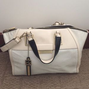 Fashionable white Calvin Klein pocketbook