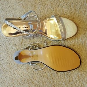 Brand New with the box Silver heels sandals (NWOT)
