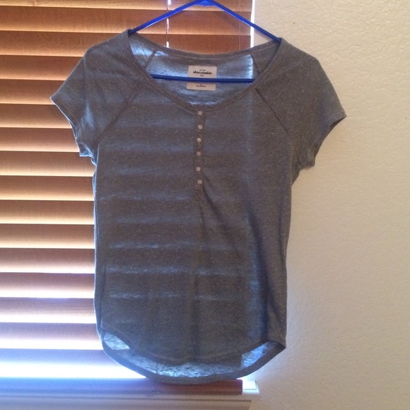 grey t shirt with buttons