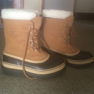 Brand new Sorel Caribou boots in sand.