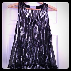 Black and silver stripped shirt. Sheer and loose