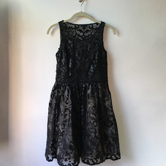 Black fit and flare dress with design detail