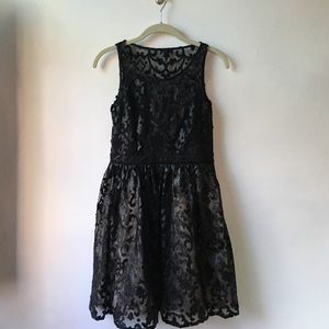 Black fit and flare dress with design detail