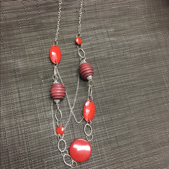 Long red beaded necklace