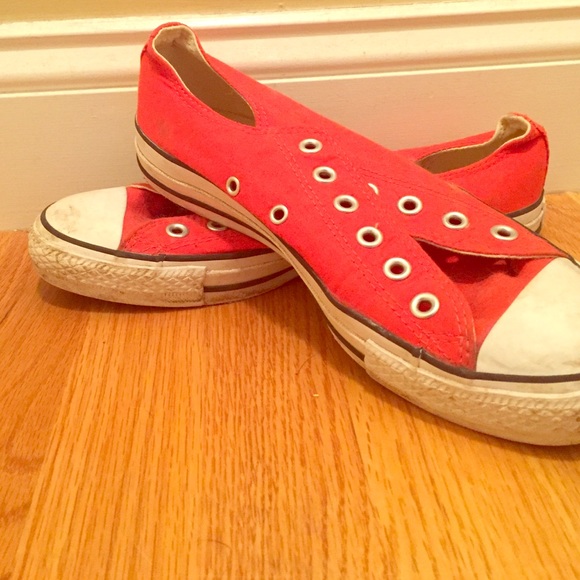 Orange low top Converse sneakers