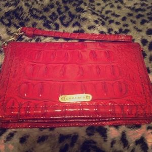 Red Brahmin glassy wristlet.