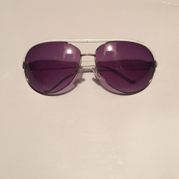 USED sunglasses with purple tint