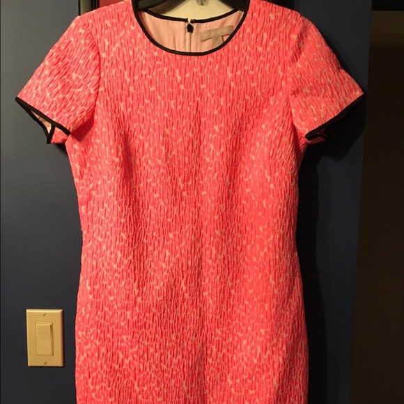 Pink dress with black embellishments