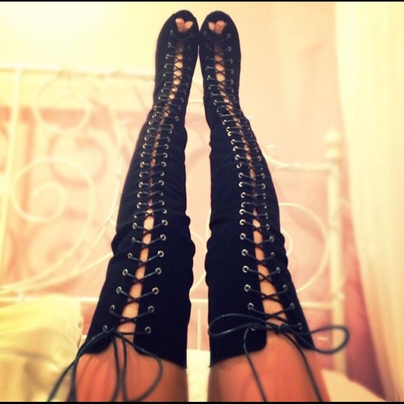 Brand new never been worn lace up thigh high boots