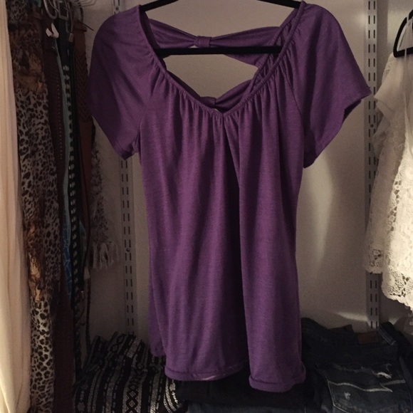 Purple short sleeve. With bow back.