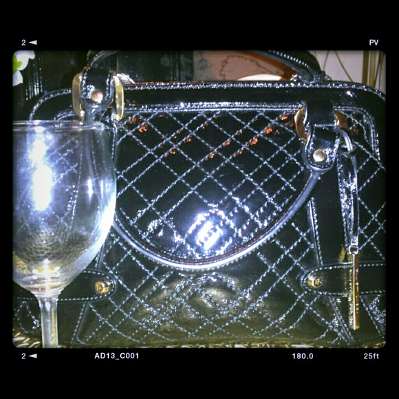 Black patent Elliott Lucca satchel