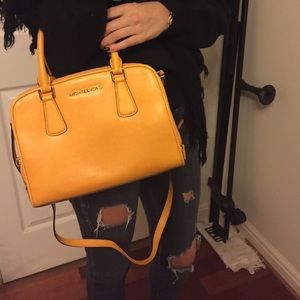 Authentic yellow Michael Kors bag.