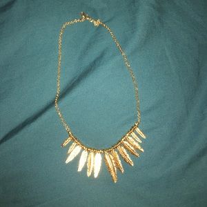Gold feather necklace
