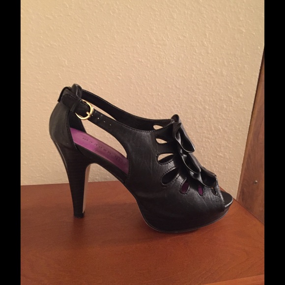 Black booties with cut-outs