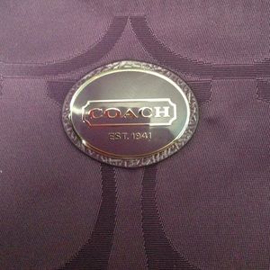 Purple COACH cross body purse. NEW WITH TAGS!!