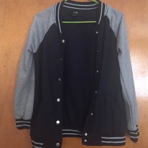 Navy blue and gray sweater .