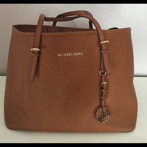 Gently used Authentic Michael Kors Jet Set Tote.
