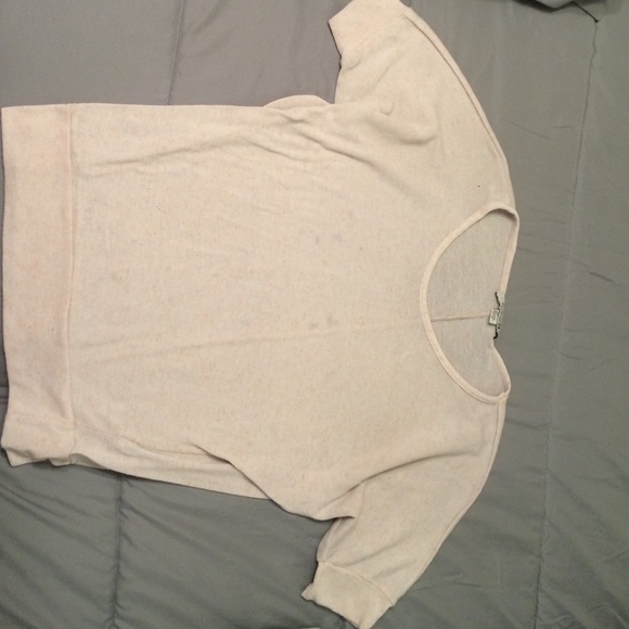a light pink loose shirt