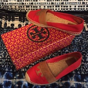 Tory Burch women's red flat espadrilles.