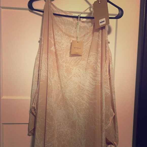 Umgee poncho style top.