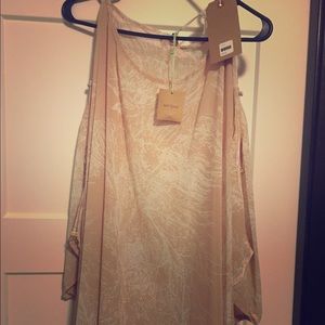 Umgee poncho style top.