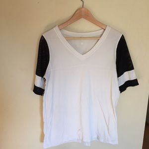 Lululemon tee shirt with mesh striped sleeves.