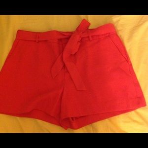 Orang red shorts