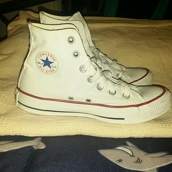 Basically brand new white high top chucks