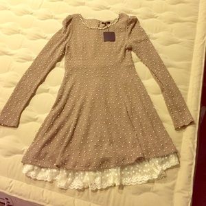 A cute taupe colored and lace dress
