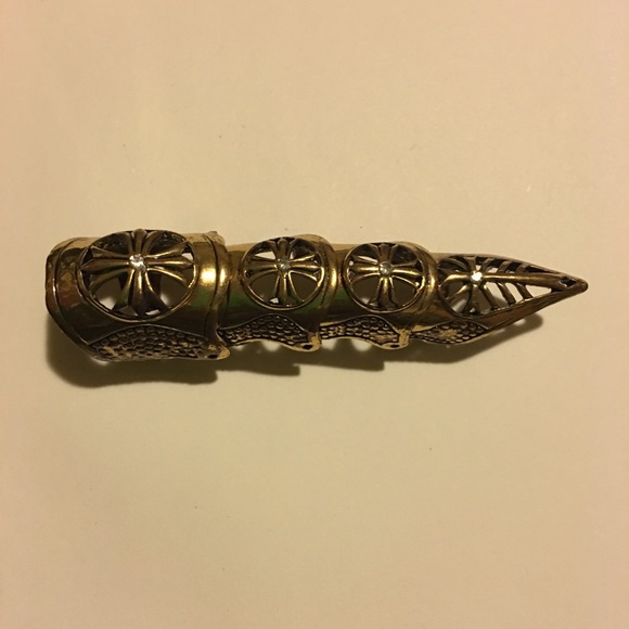 Golden finger ring.