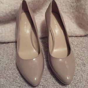 Size 6 Nine West Taupe colored heels.