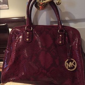 Authentic Michael Kors handbag.