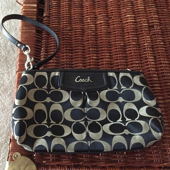 Classic Coach Wristlet. Black and Tan. No defects
