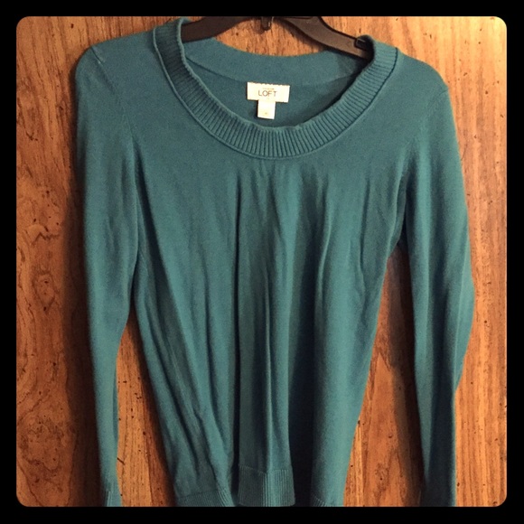A teal sweater