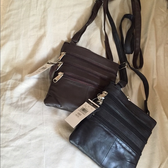 Brand new Leather bags with tags.