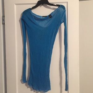 Sexy distressed off the shoulders sweater.