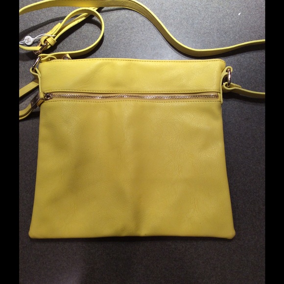 Yellow colored cross body bag