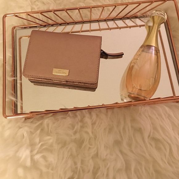 Kate spade zip around rose gold Newbury wallet