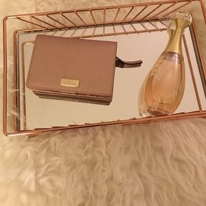 Kate spade zip around rose gold Newbury wallet