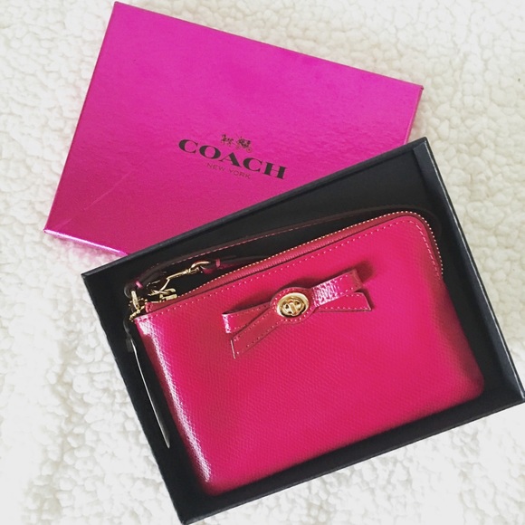Coach Handbags - ⭐️NWT coach Cranberry Pink wristlet with Gift Box