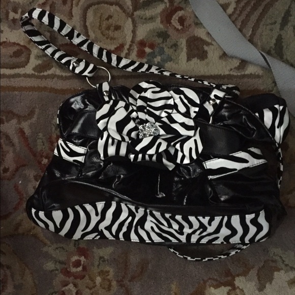 Black and zebra print purse