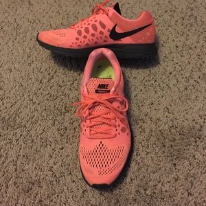 price negotiable. orange and black nike shoes